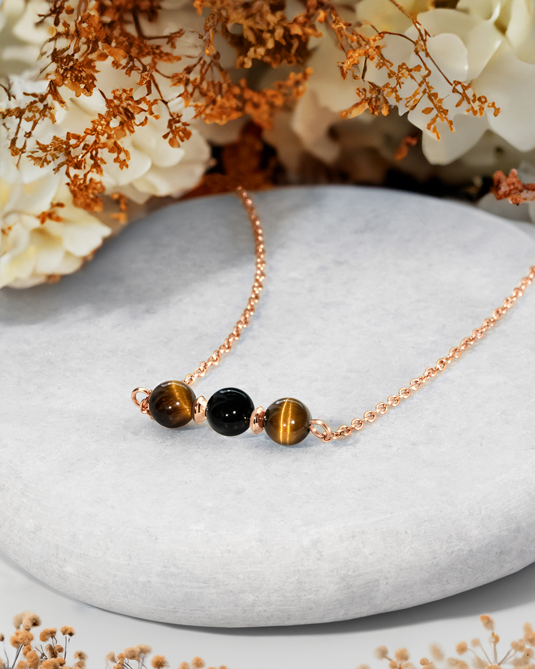 Packshot Anhänger Tigerauge + OnyxSchutz